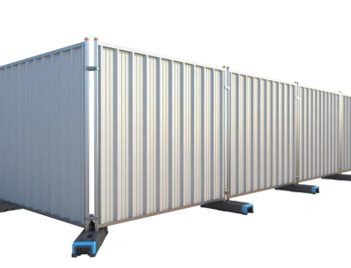 Modular steel hoarding panels with weighted bases forming a temporary site perimeter